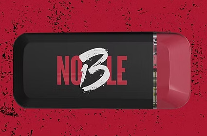 A black and red rectangular tray on a red, splattered background. The tray has the word "NOBLE," with the "B" replaced by a white, painted number "3.