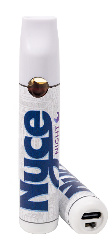 Two white vaping devices labeled "Nyce Night" with blue and purple text, one standing upright and the other lying down to show a USB charging port.