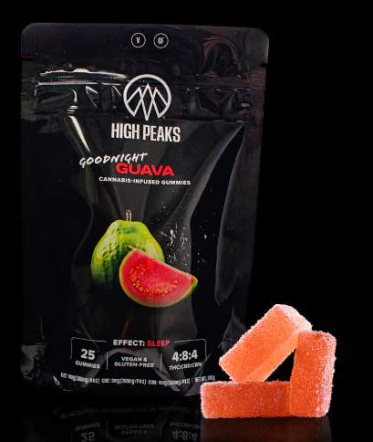 High Peaks Goodnight Guava cannabis gummies package with three orange gummies on a black background.